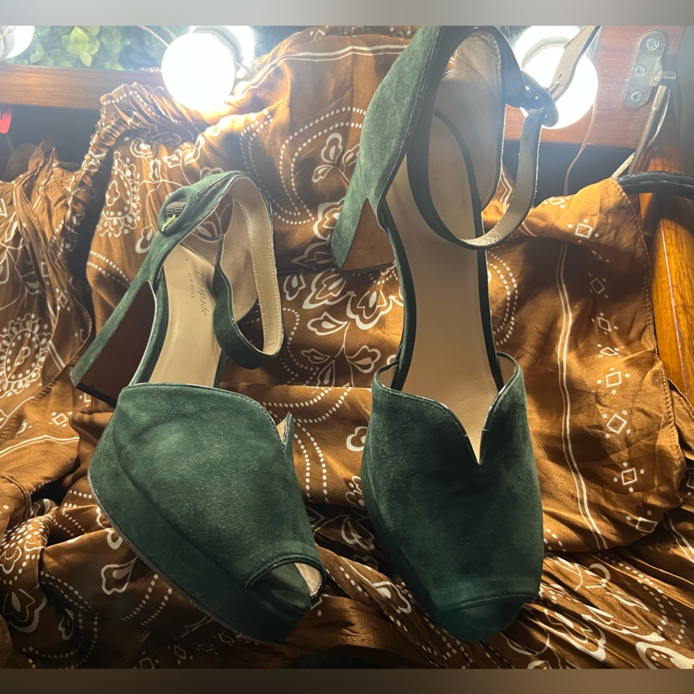 Used to film a popular Netflix show. Kate Spade “Perry” platform, green suede